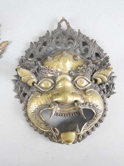 TIBET or INDONESIA: Two bronze sconce masks...