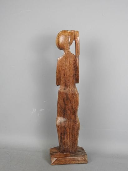 AFRICA: Modern sculpture of a long-skirted...