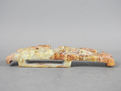 CHINA: Carved stone belt buckle decorated...