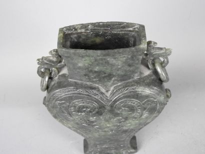 CHINA: Spinach-green jadeite stone covered...