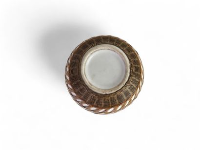 Porcelain and woven bamboo double gourd vase....