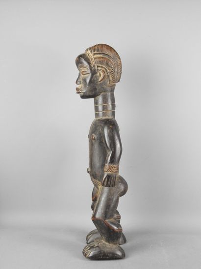 Ivory Coast. Hard wood with black-brown patina....