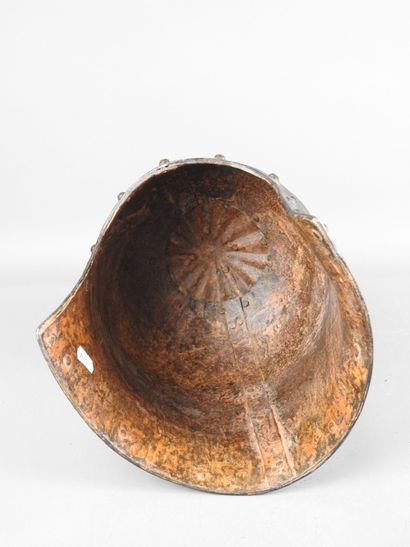 CHINA. Fancy helmet in patinated iron with...