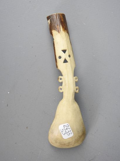 Two ceremonial spoons in carved bone. Saami...