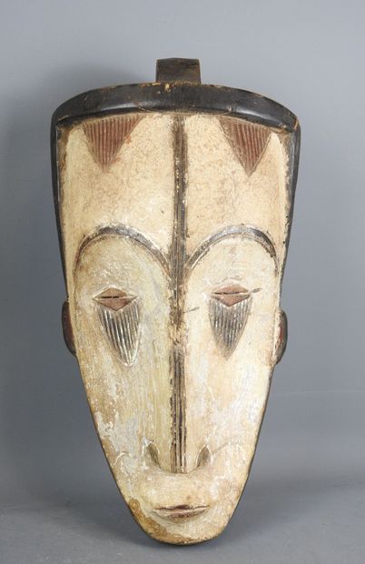 GABON: Wooden mask with ochre and black pigments,...