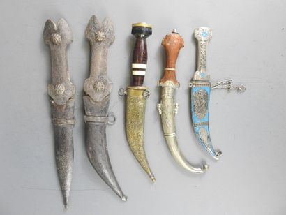 Five oriental daggers. Metal, horn, wood,...
