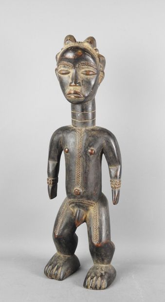 Ivory Coast. Hard wood with black-brown patina....
