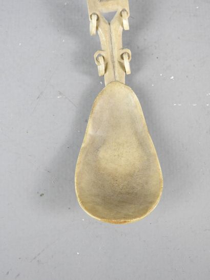Two ceremonial spoons in carved bone. Saami...