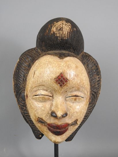 GABON: Copy of a PUNU mask in wood and black,...