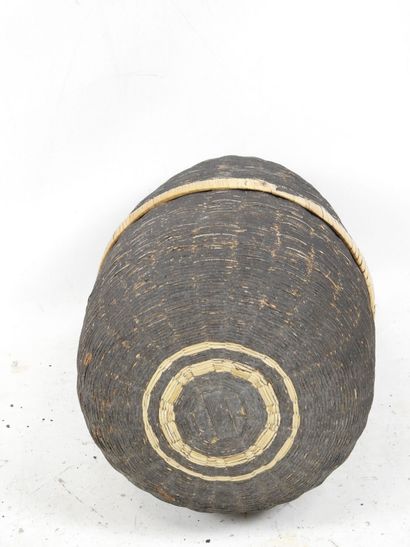 SOUTHEAST ASIA: Large covered basket in wickerwork....