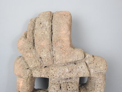 MEXICO CITY: Lava stone statue of a stylized...