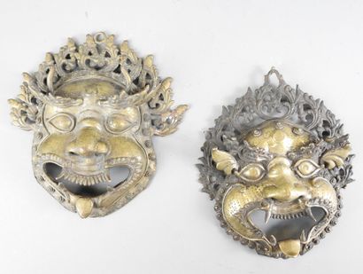 TIBET or INDONESIA: Two bronze sconce masks...