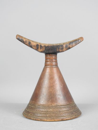 Neck rest on conical foot, KAFFA, Ethiopia.
Wood,...