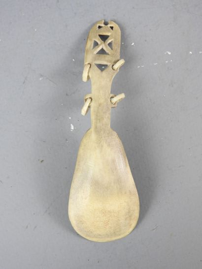 Two ceremonial spoons in carved bone. Saami...