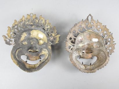 TIBET or INDONESIA: Two bronze sconce masks...
