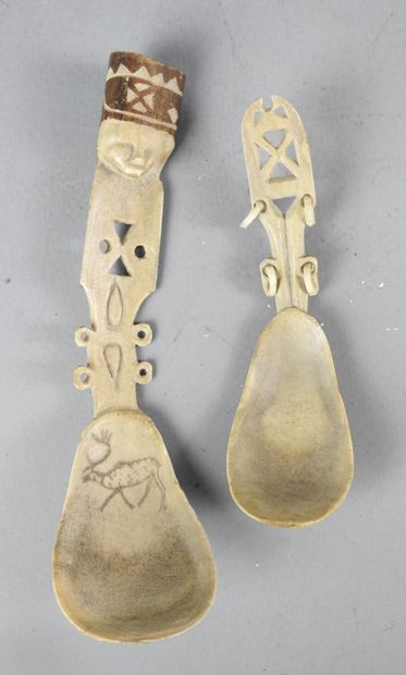 Two ceremonial spoons in carved bone. Saami...