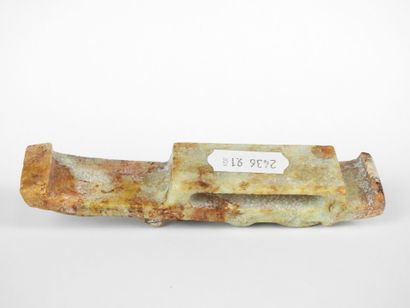 CHINA: Carved stone belt buckle decorated...