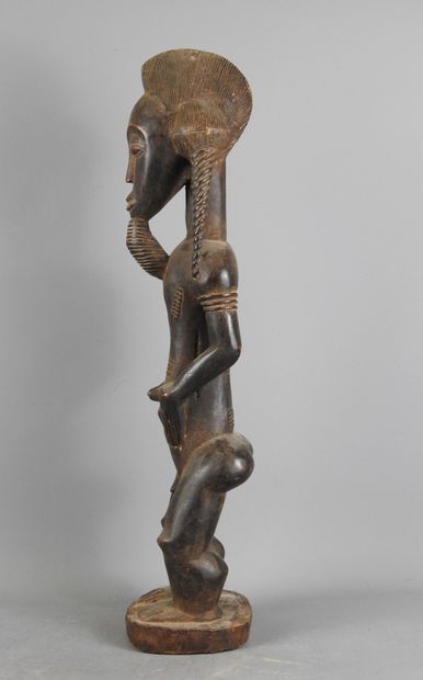 Baoulé Côte d'ivoire : Bois dur, patine brun-foncé....