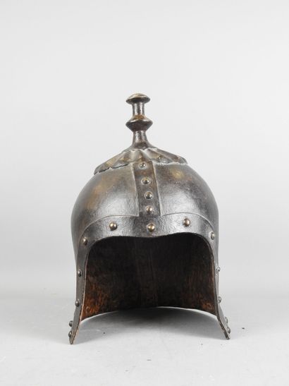 CHINA. Fancy helmet in patinated iron with...