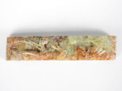 CHINA: Carved stone belt buckle decorated...