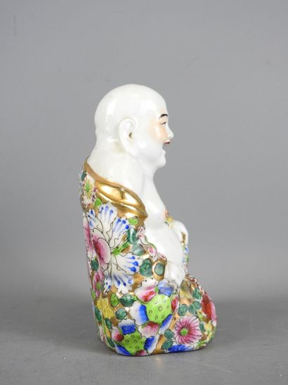 Chine.
Bouddha rieur en porcelaine à décor...