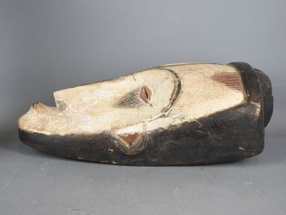 GABON: Wooden mask with ochre and black pigments,...