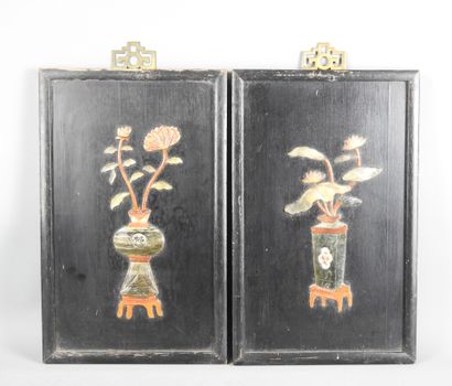 INDOCHINA: Two wooden panels carved with...