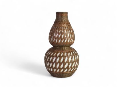 Porcelain and woven bamboo double gourd vase....