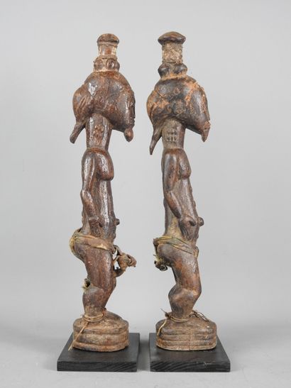 Baule Ivory Coast: Two carved wooden statues...