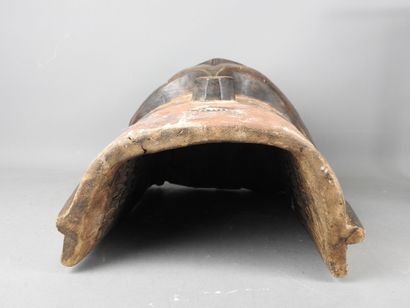 NIGERIA: Wood and pigment mask depicting...