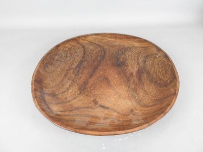 AFRICA: Circular dish in exotic wood. Diam....