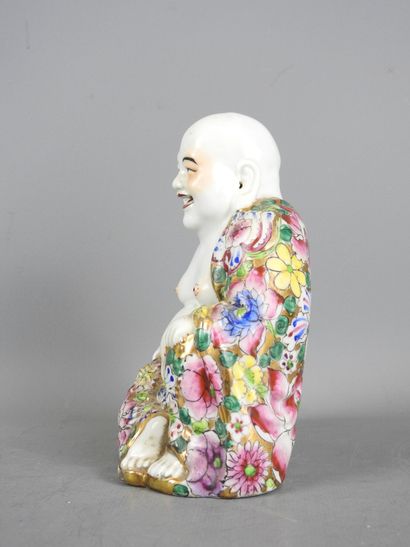 Chine.
Bouddha rieur en porcelaine à décor...