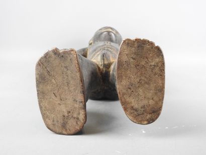 Ivory Coast. Hard wood with black-brown patina....