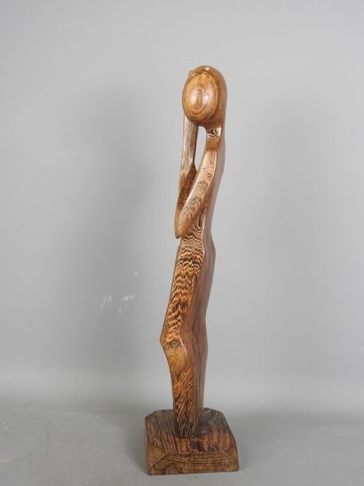 AFRICA: Modern sculpture of a long-skirted...