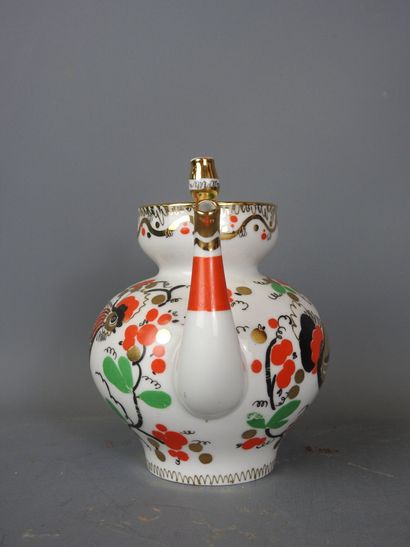 RUSSIA: Porcelain teapot with bird design....