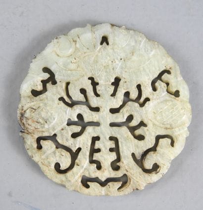 CHINA: Circular medallion in openwork jadeite...
