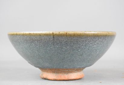 CHINA: Stoneware bowl with flamed glaze....
