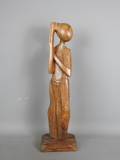 AFRICA: Modern sculpture of a long-skirted...