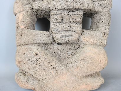 MEXICO CITY: Lava stone statue of a stylized...