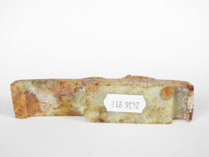 CHINA: Carved stone belt buckle decorated...