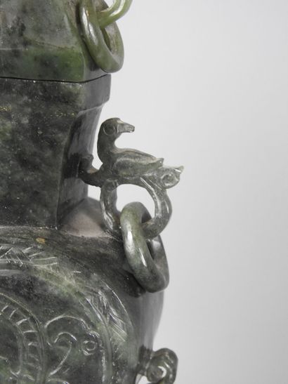 CHINA: Spinach-green jadeite stone covered...