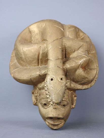 Ivory Coast: Gilded wood sculpture of a human...