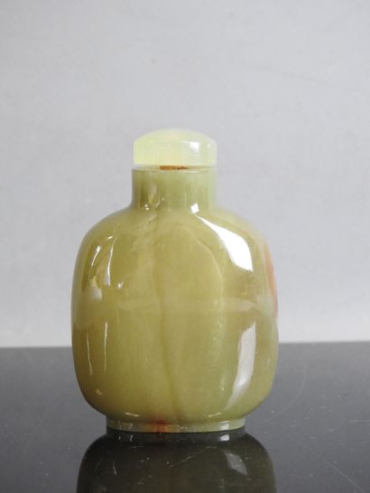 CHINA - Circa 1900
Celadon and brown jade...
