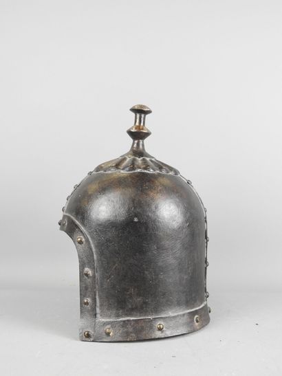 CHINA. Fancy helmet in patinated iron with...