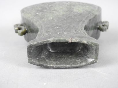 CHINA: Spinach-green jadeite stone covered...