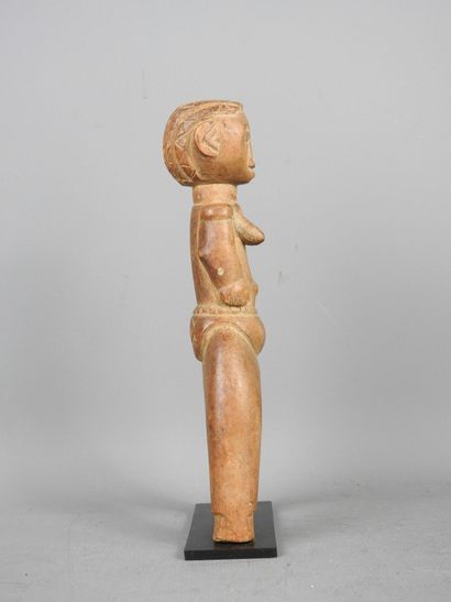 Baule, Ivory Coast.
Hardwood with natural...
