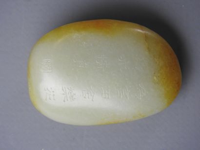 CHINA: Nephrite jade pebble with engraved...