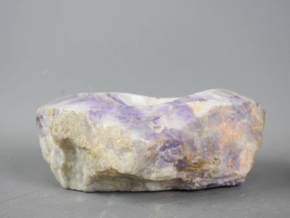 Reunion of a hand-polished rose quartz ashtray...