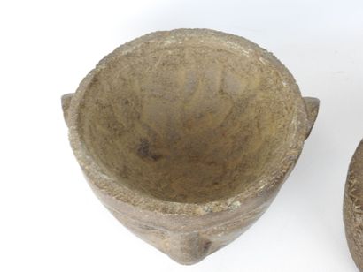 CAMBODIA: Stone head forming a box or mortar...