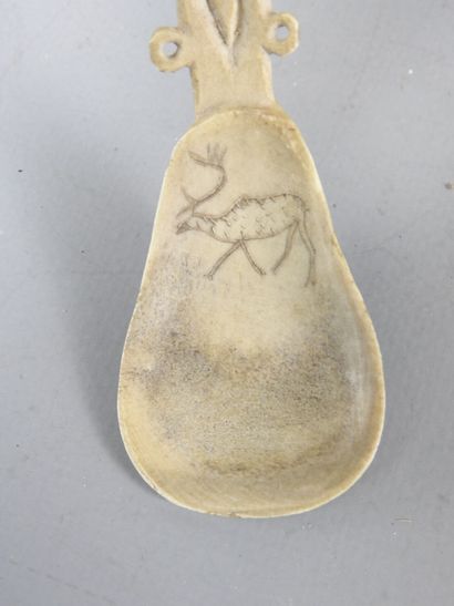 Two ceremonial spoons in carved bone. Saami...